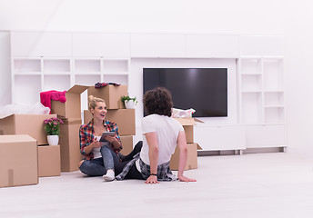 Image showing young couple moving  in new house