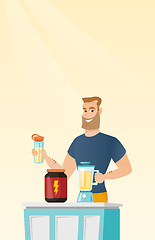 Image showing Young man making protein cocktail.