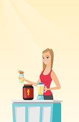 Image showing Young woman making protein cocktail.