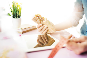 Image showing Woman and fruit diet while working on computer in office