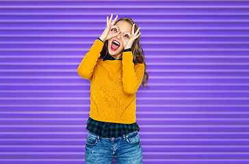 Image showing happy young woman or teen girl making faces