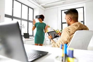 Image showing developers with virtual reality headset at office