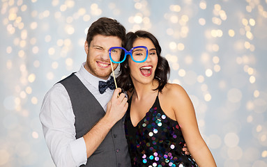 Image showing happy couple with party glasses having fun