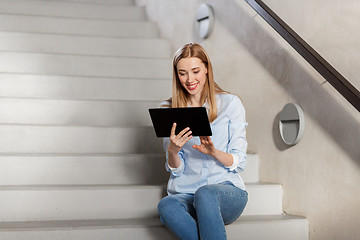 Image showing woman or student with tablet pc sitting on stairs