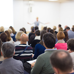 Image showing Woman giving presentation on business conference.