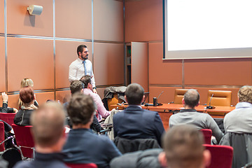 Image showing Skiled Public Speaker Giving a Talk at Business Meeting.