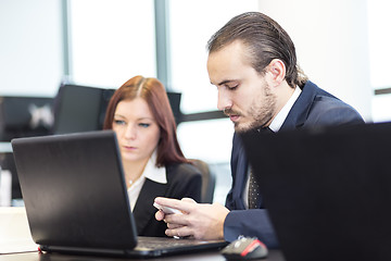 Image showing Business people in modern office.