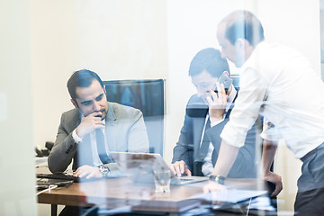 Image showing Corporate businessteam working in modern office.