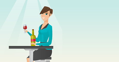 Image showing Woman drinking wine in the restaurant.