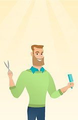 Image showing Barber holding comb and scissors in hands.