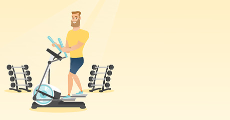 Image showing Man exercising on elliptical trainer.