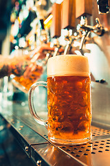 Image showing Glass of beer with barrel, bottle and fresh hops still-life