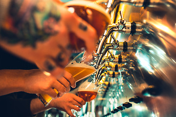 Image showing Glass of beer with barrel, bottle and fresh hops still-life