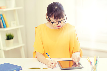 Image showing asian woman student with tablet pc at home