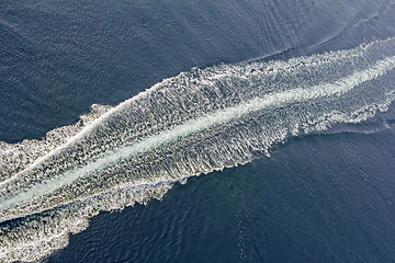 Image showing Trail of a motorboat on the water, aerial view