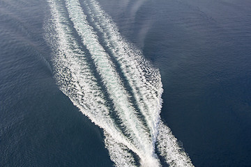 Image showing Trail of a motorboat on the water, aerial view