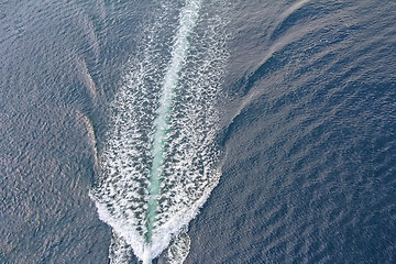 Image showing Trail of a motorboat on the water, aerial view