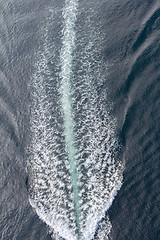 Image showing Trail of a motorboat on the water, aerial view