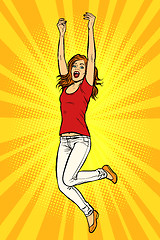 Image showing Joyful young woman jumping up