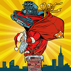 Image showing retro racing car. Santa Claus with gifts climbs into the chimney