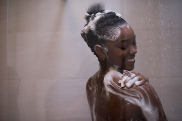 Image showing African American woman in the shower