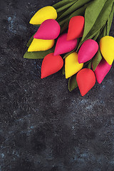 Image showing Handmade and real tulips on darken