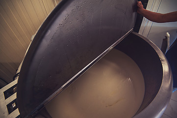 Image showing Cheese production at dairy farm