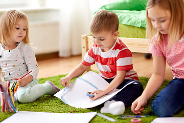 Image showing happy creative kids making crafts at home