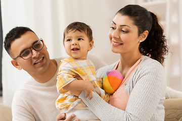 Image showing happy family with baby daughter at home
