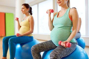 Image showing pregnant women training with exercise balls in gym