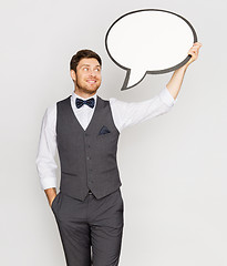 Image showing happy man in suit holding blank text bubble banner