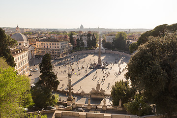 Image showing Aerial view of people, sculptures, fountain and churches on Piazza del Popolo in Rome, Italy.