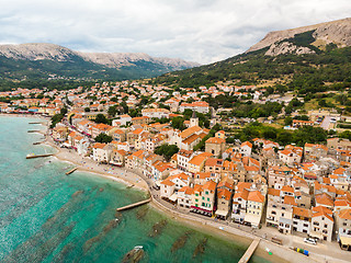 Image showing Aerial panoramic view of Baska town, popular touristic destination on island Krk, Croatia, Europe