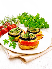 Image showing Appetizer of aubergines and cheese on board