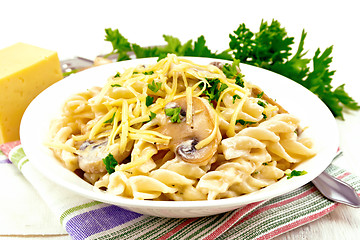 Image showing Fusilli with mushrooms on napkin