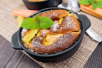 Image showing Klafuti with rhubarb in brazier on table