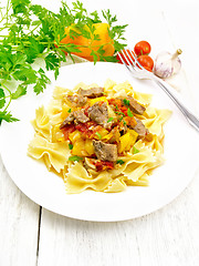 Image showing Farfalle with turkey and vegetables on board