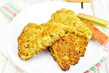 Image showing Scones with rhubarb in plate on light board