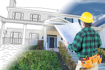 Image showing Male Contractor with Hard Hat and Tool Belt Looking At Custom Ho