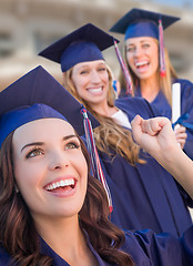 Image showing Happy Graduating Group of Girls In Cap and Gown Celebrating on C