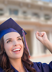 Image showing Happy Graduating Mixed Race Woman In Cap and Gown Celebrating on