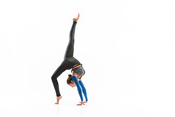 Image showing young sporty woman doing acrobatic exercise