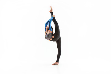 Image showing young sporty woman doing acrobatic exercise