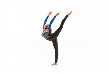 Image showing young sporty woman doing acrobatic exercise