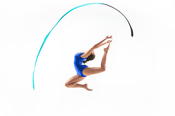 Image showing The portrait of beautiful woman gymnast on white