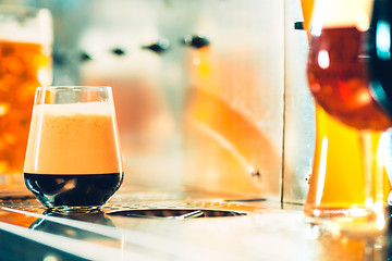 Image showing Beer taps in a pub