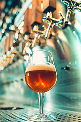 Image showing Beer taps in a pub