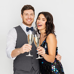 Image showing happy couple with champagne glasses at party