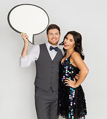 Image showing happy couple at party holding text bubble banner