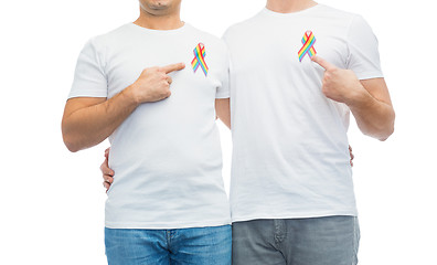 Image showing close up of couple with gay pride rainbow ribbons